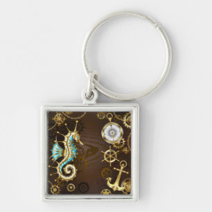 Wooden Background with Mechanical Seahorse Key Ring