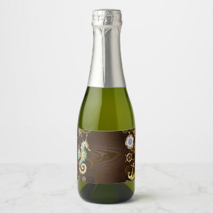 Wooden Background with Mechanical Seahorse Sparkling Wine Label