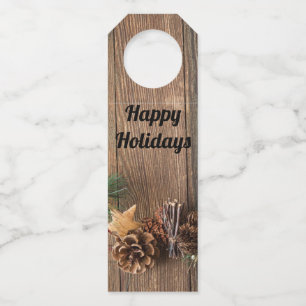 wooden background with pine cones      bottle tag