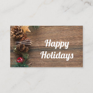 wooden background with pine cones     business card