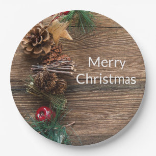 wooden background with pine cones paper plate