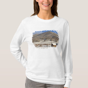 Wooden barn sits in snow near the Boulder T-Shirt
