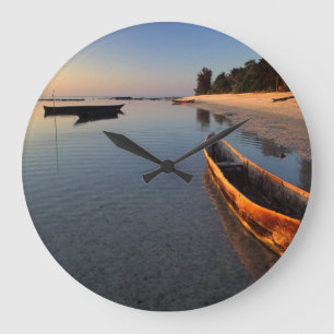 Wooden boats on Tondooni Beach Large Clock