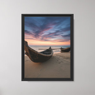 Wooden Boats Resting on Beach at Sunset Sky Canvas Print