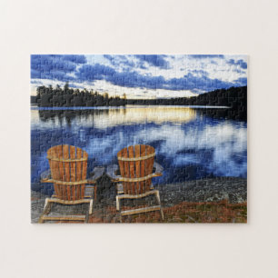 Wooden Chairs At Sunset On Lake Shore Jigsaw Puzzle
