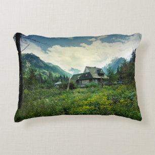 Wooden house, mountain nature scenery. decorative cushion