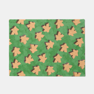 Wooden Meeples on Green Doormat