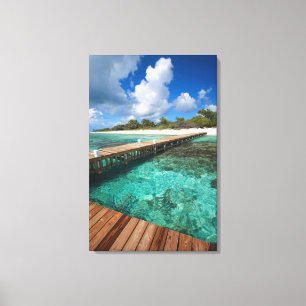 Wooden Pier Connecting to Beach Canvas Print