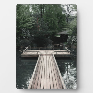 Wooden Pier framed by red Lanterns Plaque
