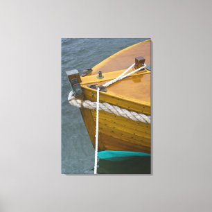 Wooden Sailboat In Water Canvas Print