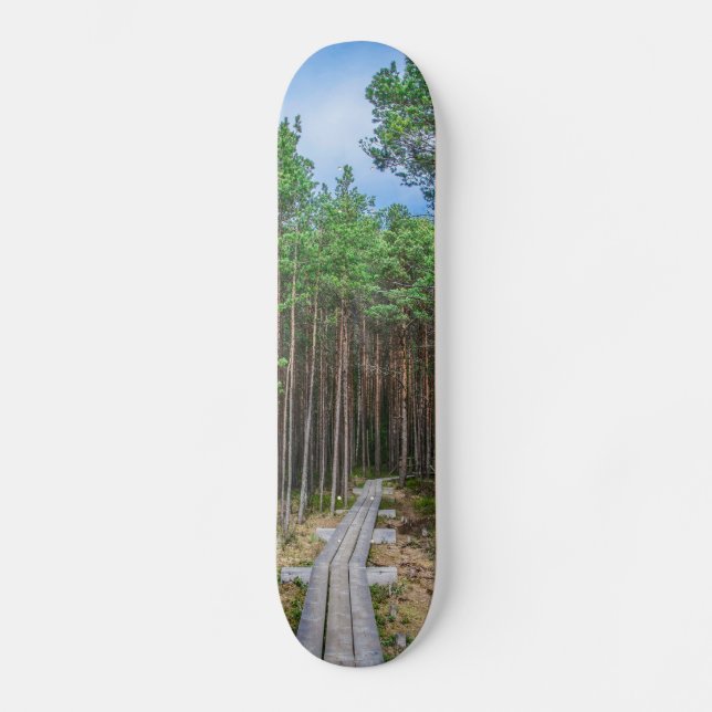Wooden trail in pine forest skateboard (Front)