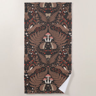 Woodland animals and plants in red and brown beach towel