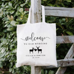 Woodland Deer Wedding Welcome Tote Bag<br><div class="desc">Welcome guests to your fall or winter wedding with these rustic chic personalised tote bags. Design features "welcome to our wedding" in a modern mix of handwritten calligraphy script and block lettering, with space to personalise with your names and date. A pair of deer (a buck and a doe) joined...</div>