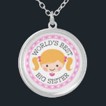 Worlds best big sister cartoon girl blonde hair silver plated necklace<br><div class="desc">Cute necklace featuring a little cartoon girl with blonde hair tied up in pigtails with pink bows. Text "World's best big sister". Around is a round,  pink border with polka dots. Also available in a version for little sisters.</div>