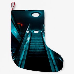 WORM'S EYE VIEW PHOTOGRAPHY OF GRAY BUILDING UNDER SMALL CHRISTMAS STOCKING