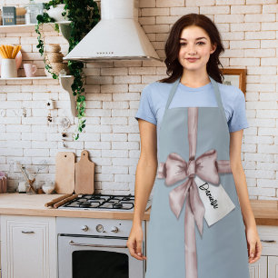 Wrapped in a pink bow apron