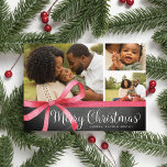 Wrapped in Red | Holiday Photo Collage Card<br><div class="desc">Festive holiday photo card features three of your favourite images adorned with a red watercolor ribbon bow illustration. "Merry Christmas" appears beneath in white lettering on a rustic chalkboard background. Personalise with your names and the year.</div>