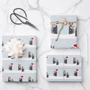 Wrapping paper set with holiday penguins