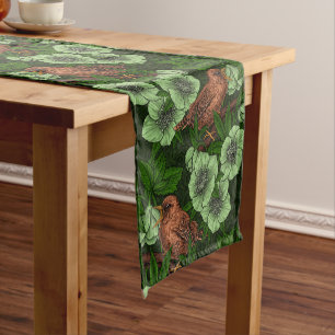 Wren and hellebore on dark green short table runner