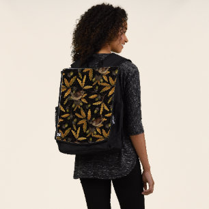 Wrens and acorns on black backpack