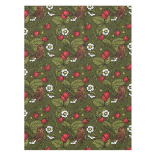 Wrens and strawberries on dark green tablecloth
