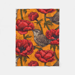 Wrens in a red anemone garden fleece blanket