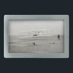 Wright Brothers Flyer First Plane Flight Aviation Belt Buckle<br><div class="desc">The Wright Flyer was a 1903 invention by Brothers Orville Wright and Wilbur Wright. The first motorised plane flight of a Aeroplane happened on December 17, 1903 near Kitty Hawk, North Carolina. This work is in the public domain in the United States because it was published (or registered with the...</div>