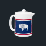 Wyoming State Flag Teapot<br><div class="desc">Add a touch of Wyoming pride to your tea time with our exclusive teapot featuring the flag of Wyoming! Crafted with meticulous attention to detail, this teapot is more than just a functional item; it’s a celebration of Wyoming’s heritage and cultural pride. The elegant design prominently displays the iconic Wyoming...</div>