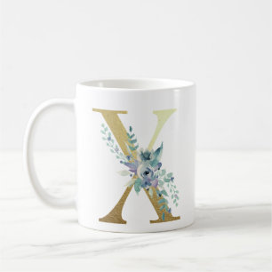 x, golden initial with blue floral foliage coffee mug