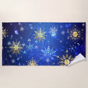 XMAS Blue Background with Golden Snowflakes Beach Towel