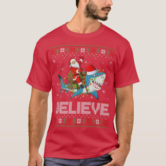 Xmas Lights Shark Believe Ugly Santa Riding Shark  T-Shirt