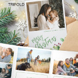 Year in review multi photo green Merry Christmas  Tri-Fold Holiday Card<br><div class="desc">Greenery holly berry foliage modern Merry Christmas green brushed script family year in review 9 photo collage gallery tri fold holiday card with your custom personalised text.</div>