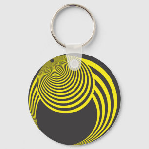 Yellow and black sphere and hole illusion key ring