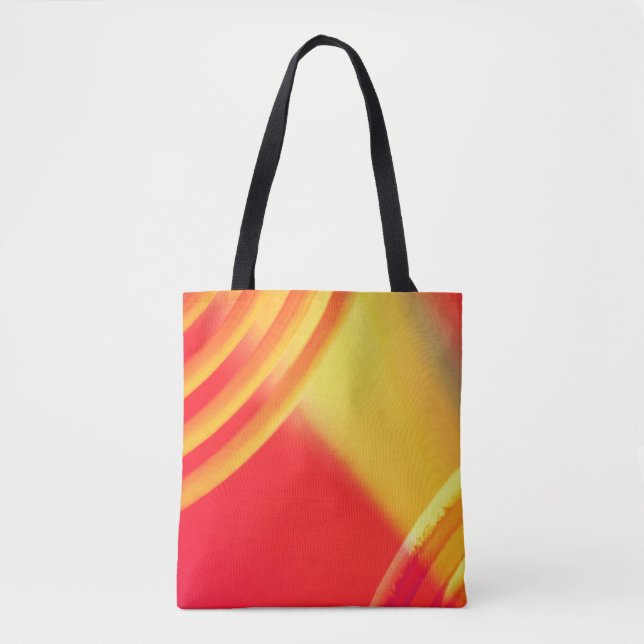 Yellow and orange circular pattern on a tote (Front)