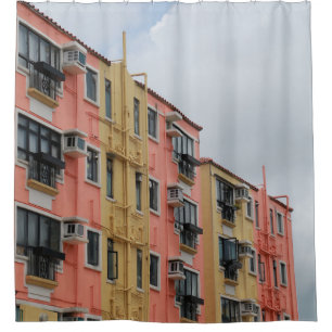 YELLOW AND RED CONCRETE BUILDING UNDER WHITE CLOUD SHOWER CURTAIN