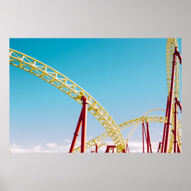 Yellow and red roller coaster under blue sky at da poster (Front)