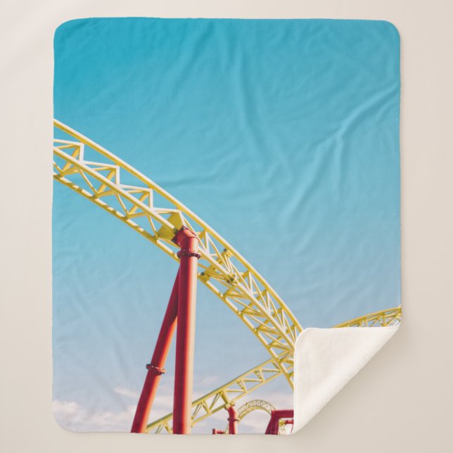 Yellow and red roller coaster under blue sky at da sherpa blanket (Front)