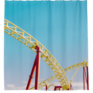 Yellow and red roller coaster under blue sky at da shower curtain