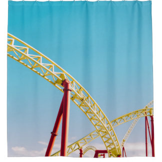Yellow and red roller coaster under blue sky at da shower curtain