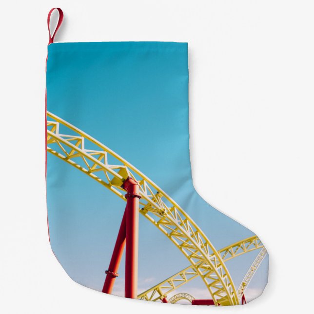 Yellow and red roller coaster under blue sky at da small christmas stocking (Front)