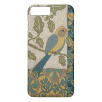 Yellow and Teal Blue Bird Perched on a  Branch
