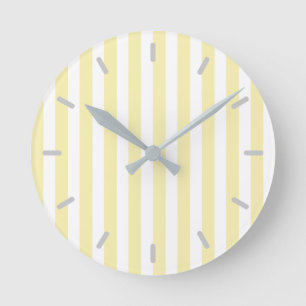 Yellow and white candy stripes round clock