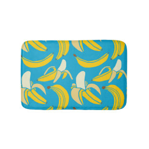 Yellow bananas, blue background pattern bath mat