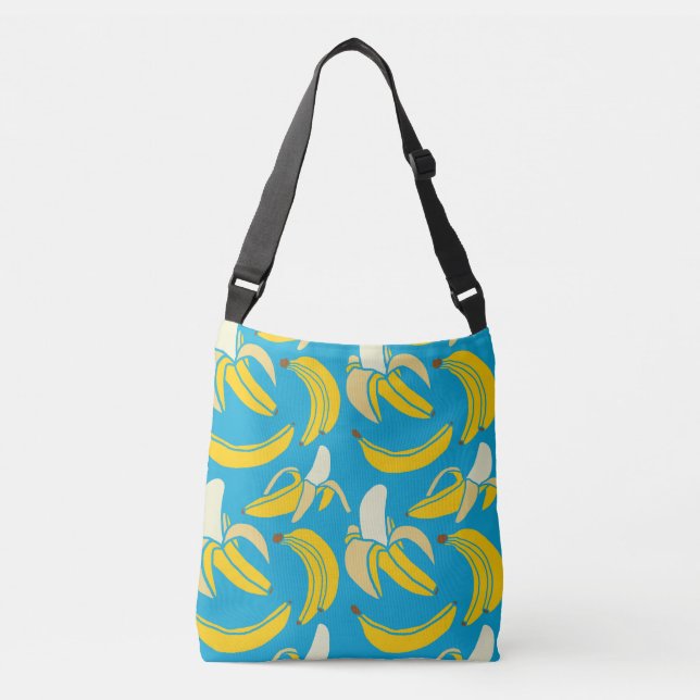 Yellow bananas, blue background pattern crossbody bag (Front)