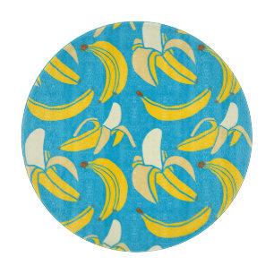 Yellow bananas, blue background pattern cutting board