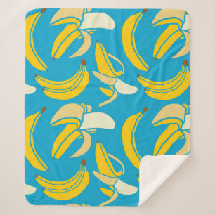 Yellow bananas, blue background pattern sherpa blanket