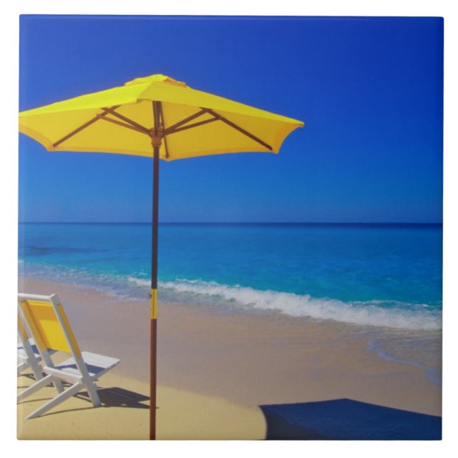 Yellow beach umbrella and chairs on pristine tile (Front)