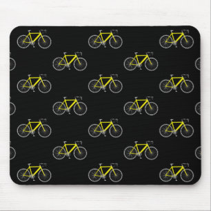 yellow bicycle on black mouse mat