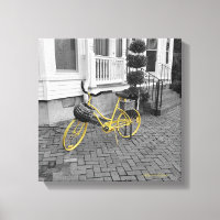 Yellow Bicycle on Cobblestones
