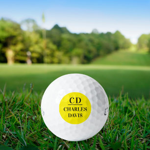 Yellow black monogram initials name golf balls